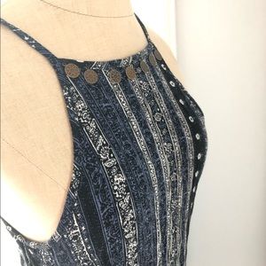 Blue+White Romper with metal charm detailing.